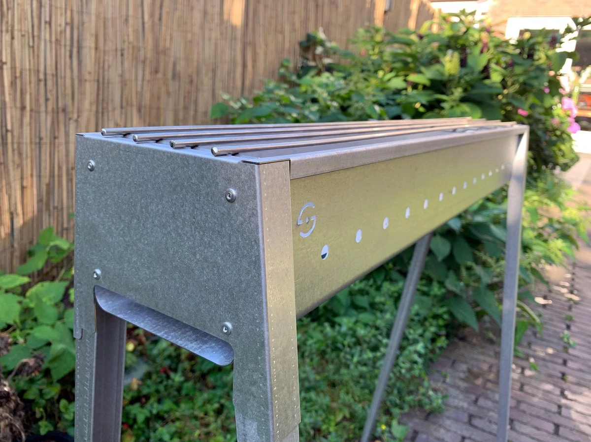 Spiedini Saté-bbq Bali 80 - Saté Houtskoolbarbecue Met Horizontaal Rooster - 80 Cm Lang, 11 Cm Breed - Materiaal: Gealuminiseerd Ijzer 13 Spiedini Saté-bbq Bali 80 - Saté Houtskoolbarbecue Met Horizontaal Rooster - 80 Cm Lang, 11 Cm Breed - Materiaal: Gealuminiseerd Ijzer - Image 11